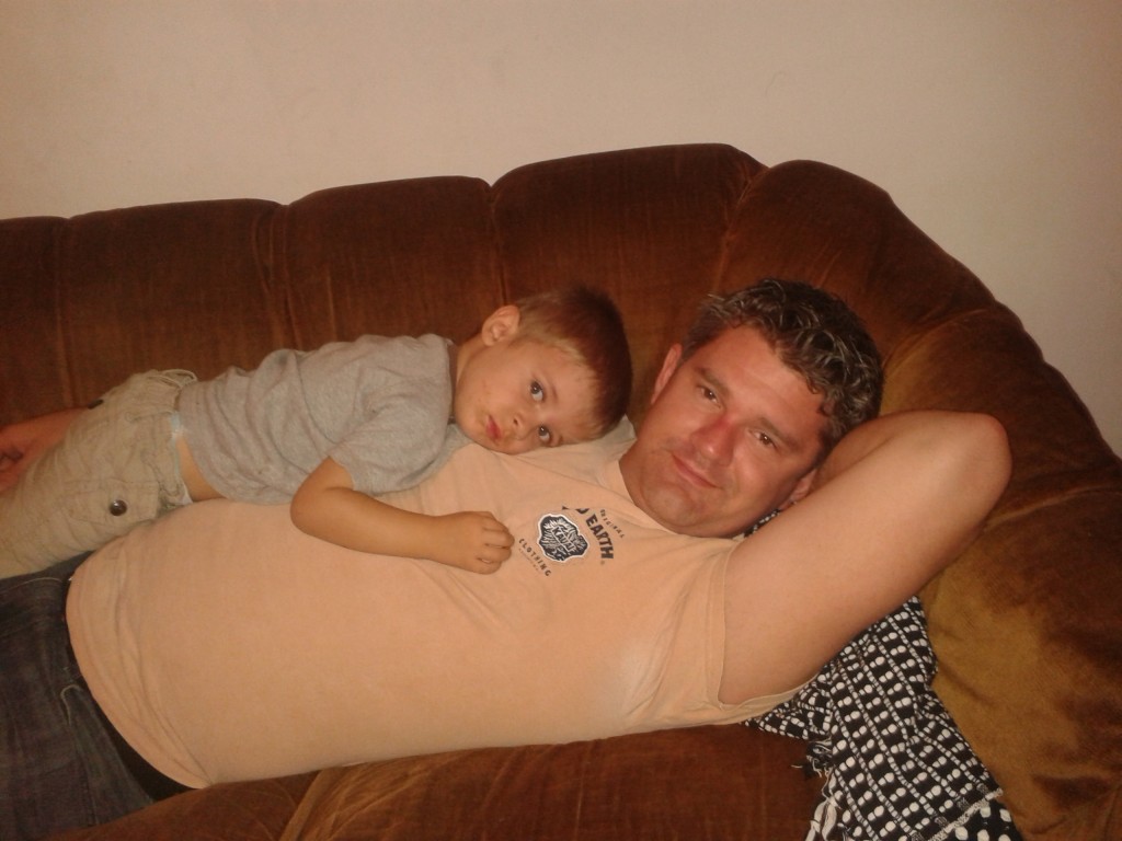 19-cuddles with Dad on the couch