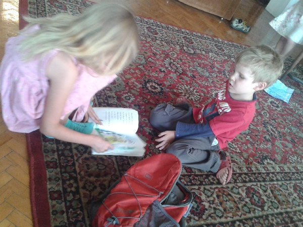 07.11 little sister reading to her brother