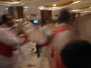 Dancing with a live band in the lobby BEFORE going up to the reception together.
