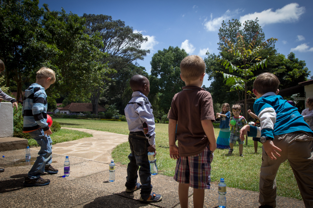 Playing games with other kids from our organisation